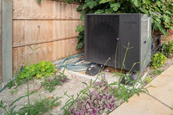 Image of a heat pump in a garden.
